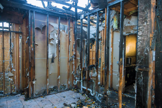 Professional Emergency Fire Cleanup technician working in Red Oaks Mill, NY